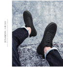 Tênis de lona de cano alto masculino deslizamento-on rendas casuais all-preto sapatos de skate básicos para estudantes sola plana sapatos esportivos confortáveis