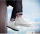 Tênis de lona de cano alto masculino deslizamento-on rendas casuais all-preto sapatos de skate básicos para estudantes sola plana sapatos esportivos confortáveis