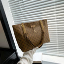 Nova presbiopia bolsa textura de couro macio grande capacidade bolsa feminina com acessórios pendurados bolsa de ombro