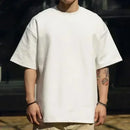 Nova Camiseta Premium de Algodão Oversized Preta com Estampa de Luxo 2026 Verão Casual de Negócios com Gráficos para Homens e Mulheres