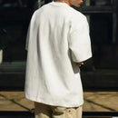 Nova Camiseta Premium de Algodão Oversized Preta com Estampa de Luxo 2026 Verão Casual de Negócios com Gráficos para Homens e Mulheres