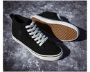 Tênis de lona de cano alto masculino deslizamento-on rendas casuais all-preto sapatos de skate básicos para estudantes sola plana sapatos esportivos confortáveis