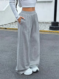 Calças de jogging femininas com cordão, casuais e confortáveis com bolsos, calças esportivas de cintura média, adequadas para todas as estações