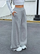 Calças de jogging femininas com cordão, casuais e confortáveis com bolsos, calças esportivas de cintura média, adequadas para todas as estações