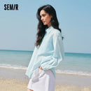 Camisa Feminina Semir com Proteção UV 2026, Texturizada, Lisa, Ombro Caído, Estilo Urbano Casual para o Dia a Dia, Macia e Confortável